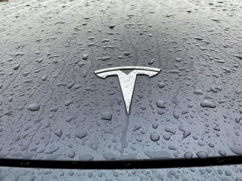 Tesla reports record quarterly deliveries but misses estimates