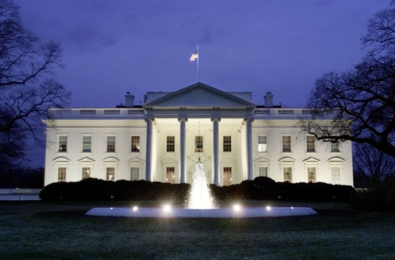 &copy; Reuters. The North Portico of the White House as seen from Pennsylvania Avenue moments after the outside house lights were turned on March 6, 2001.

LSD