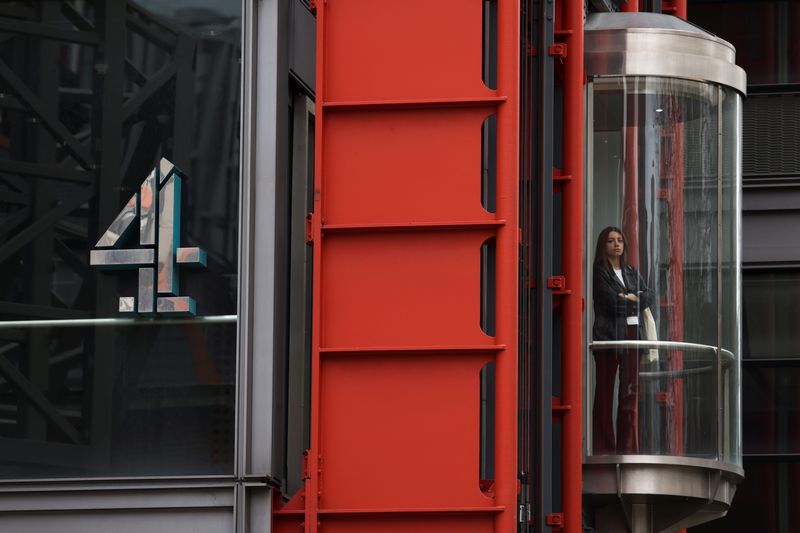 &copy; Reuters. FILE PHOTO: A woman rides in an elevator at Channel 4 Television studios in London, after the government decided to privatise the publicly-owned broadcaster, in London, Britain, April 5, 2022. REUTERS/Tom Nicholson/File Photo