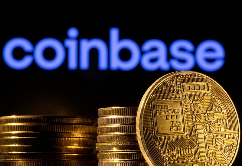 &copy; Reuters. Photo d'illustration d'une représentation de la crypto-monnaie et du logo de Coinbase prise le 4 mars 2022/REUTERS/Dado Ruvic