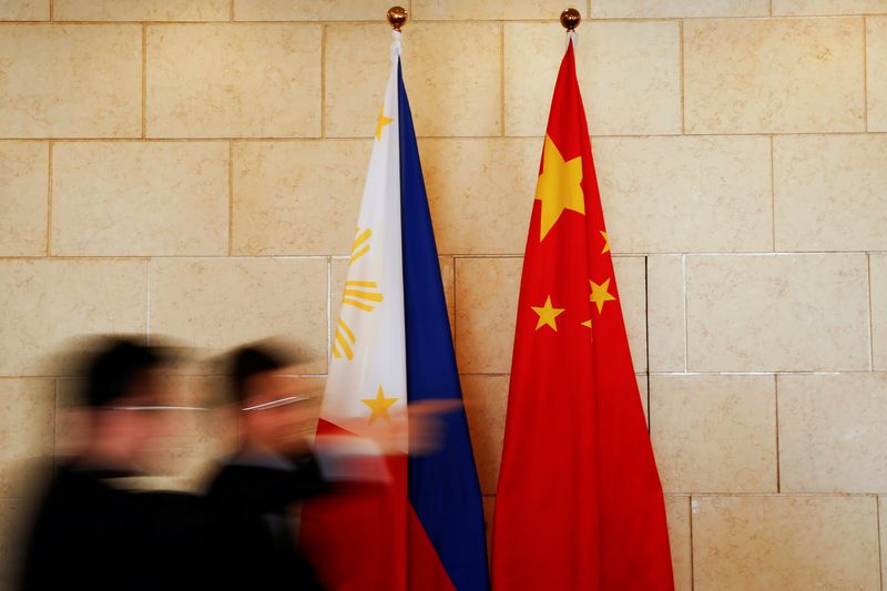 &copy; Reuters. National flags are placed outside a room where Philippine Finance Secretary Carlos Dominguez and China's Commerce Minister Gao Hucheng address reporters after their meeting in Beijing, China, January 23, 2017. REUTERS/Damir Sagolj/Files