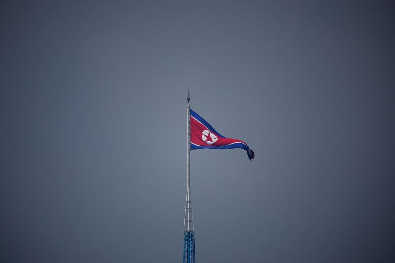 © Reuters. A North Korean flag flutters at the propaganda village of Gijungdong in North Korea, in this picture taken near the truce village of Panmunjom inside the demilitarized zone (DMZ) separating the two Koreas, South Korea, July 19, 2022.    REUTERS/Kim Hong-Ji/Pool/Files