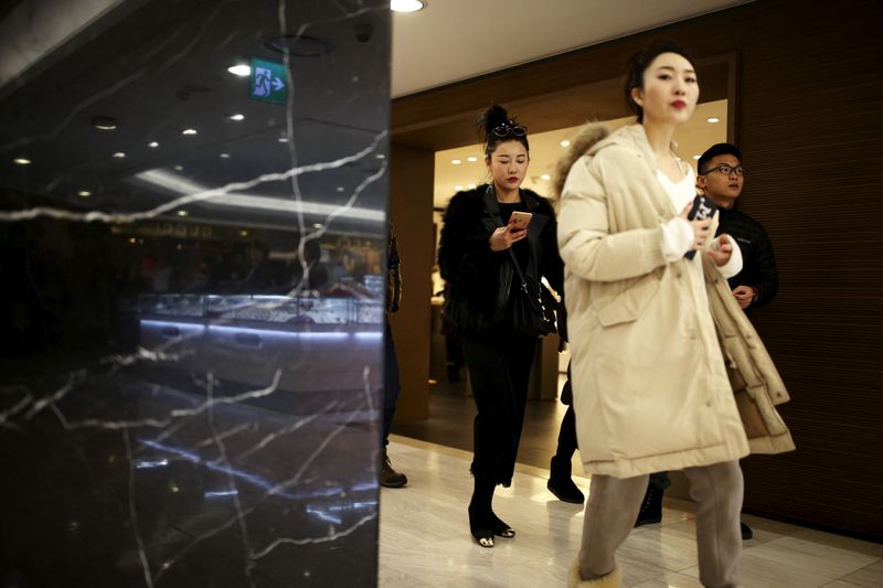 As travel resumes, China's luxury shoppers ask: Paris or Hainan?