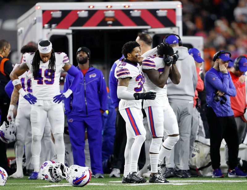 NFL-Bills' Hamlin improving but still critical, doctors say