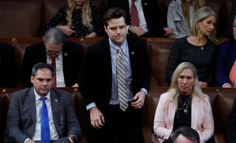 &copy; Reuters. Rep. Matt Gaetz (R-FL) casts his vote for Speaker of the House for former U.S. President Donald Trump as he stands next to Rep. Marjorie Taylor Greene (R-GA) during a 7th round of voting for Speaker of the House on the third day of the 118th Congress at t