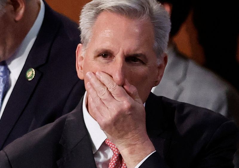 &copy; Reuters. FILE PHOTO: House Republican Leader Kevin McCarthy (R-CA) places his hand over his mouth as he stands inside the House Chamber during voting for a new Speaker on the third day of the 118th Congress at the U.S. Capitol in Washington, U.S., January 5, 2023.