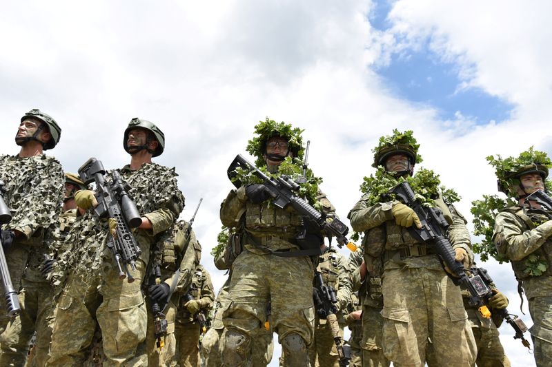 &copy; Reuters. FILE PHOTO: Soldiers of the Kosovo Security Force (KSF) line up during the 'Defender Europe 21' military exercise, in village Deve near Gjakova, Kosovo May 28, 2021. REUTERS/Laura Hasani