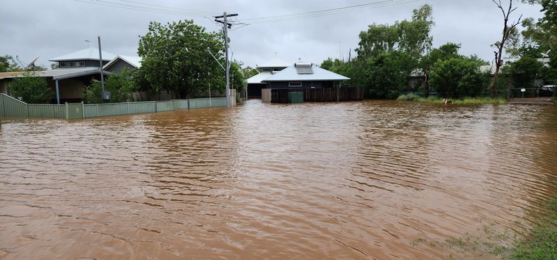 &copy; Reuters. A view of flooding in Fitzroy Crossing, Australia January 3, 2023 in this picture obtained from social media. Callum Lamond/via REUTERS  