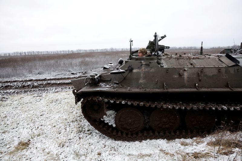 &copy; Reuters. FILE PHOTO: Vlad from the 80th Separate Air Assault Brigade drives an APC on the front line at Orthodox Christmas, during a ceasefire announced by Russia over the Orthodox Christmas period, from the frontline region of Kreminna, Ukraine, January 6, 2023. 