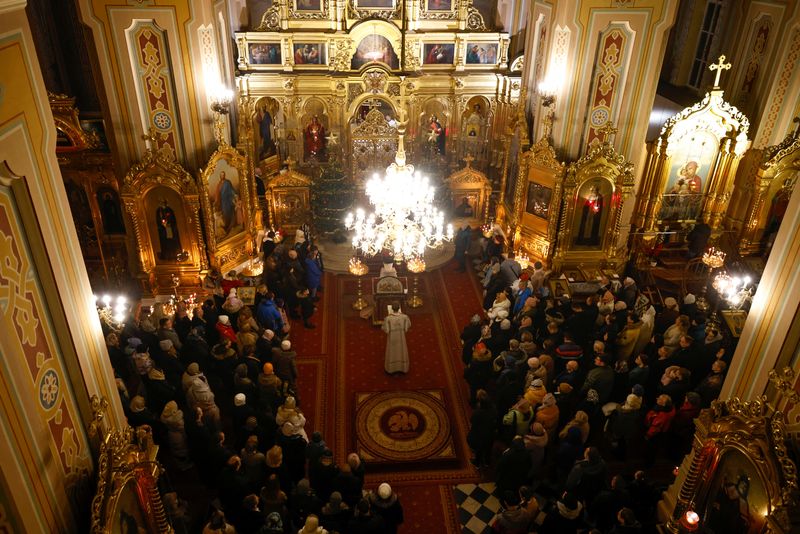 Ukrainians mark Orthodox Christmas in Europe with a prayer to return home
