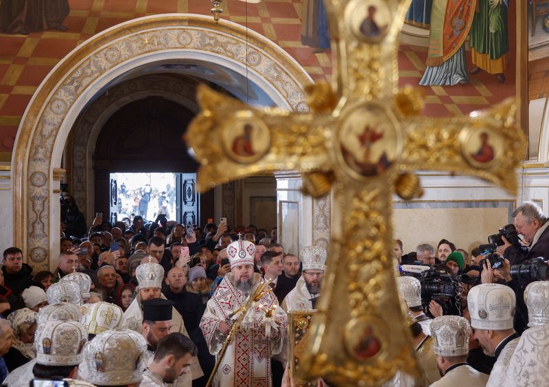 Christmas joy and anger for rival Orthodox churches in historic Kyiv monastery