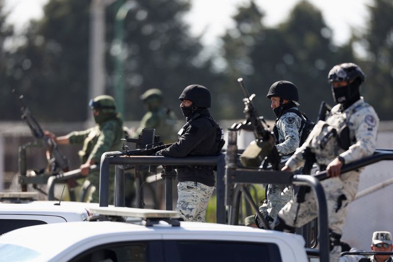 &copy; Reuters. Soldiers and members of the National Guard stand outside the Altiplano high security prison where Mexican drug gang leader Ovidio Guzman, the 32-year-old son of jailed kingpin Joaquin "El Chapo" Guzman, is imprisoned in Almoloya de Juarez, State of Mexico