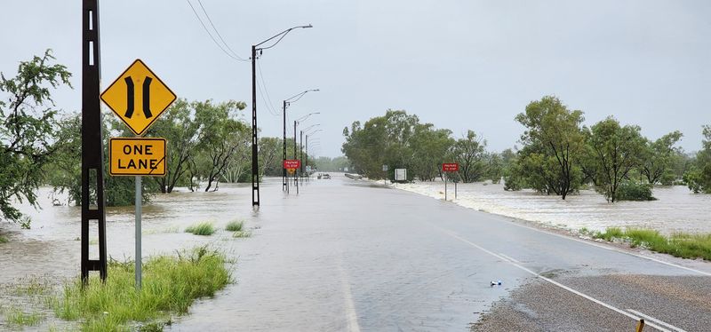 &copy; Reuters. A view of flooding in Fitzroy Crossing, Australia January 3, 2023 in this picture obtained from social media. Callum Lamond/via REUTERS  