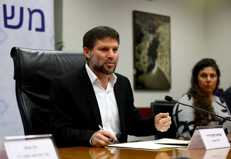 © Reuters. Israeli Finance Minister Bezalel Smotrich speaks at a news conference after announcing that he will sign an order to seize Palestinian Authority funds and transfer them to the families of victims of Palestinian attacks, at Israel's Finance Ministry in Jerusalem, January 8, 2023. REUTERS/Ronen Zvulun