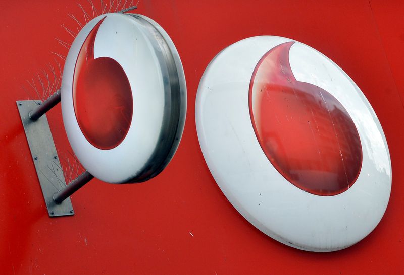 &copy; Reuters. FILE PHOTO: Vodafone branding is seen outside a retail store in London November 12, 2013.    REUTERS/Toby Melville