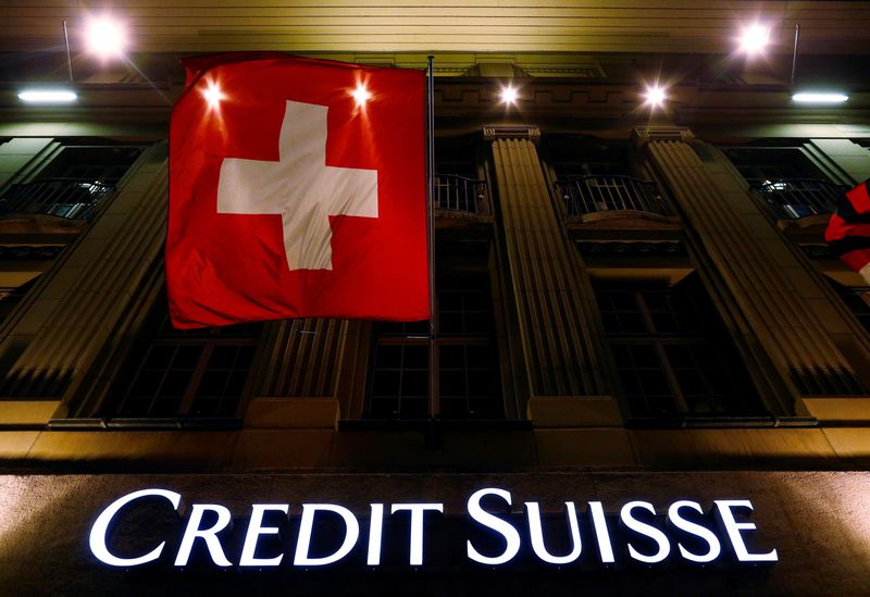 &copy; Reuters. FILE PHOTO: The logo of Swiss bank Credit Suisse is seen below the Swiss national flag at a building in the Federal Square in Bern May 15, 2014.   REUTERS/Ruben Sprich/     