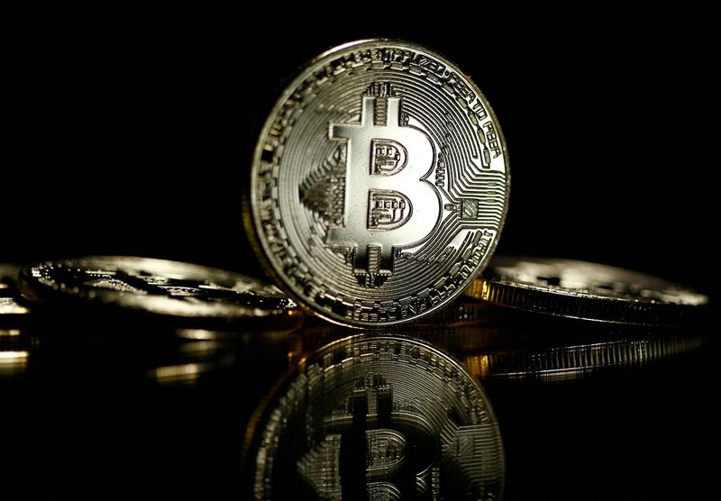 &copy; Reuters. FILE PHOTO: Bitcoin are seen in this illustration picture taken September 27, 2017.  REUTERS/Dado Ruvic/File Photo
