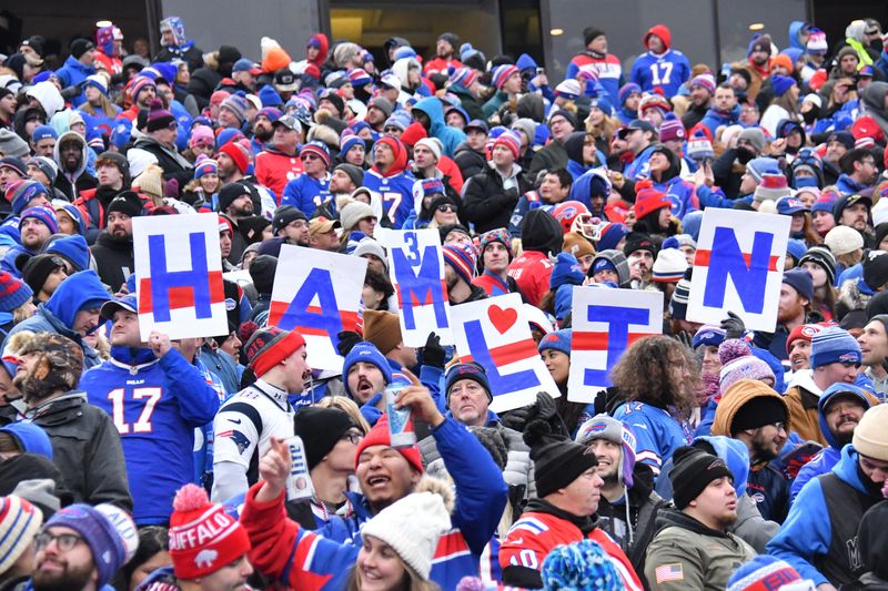 &copy; Reuters. FILE PHOTO: Jan 8, 2023; Orchard Park, New York, USA; Buffalo Bills fans show support for Damar Hamlin during a game against the New England Patriots at Highmark Stadium. Mandatory Credit: Mark Konezny-USA TODAY Sports