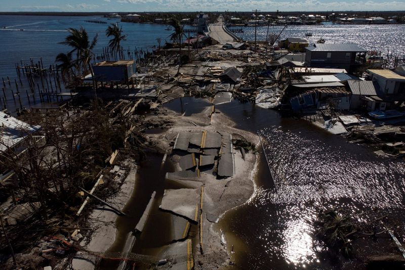 &copy; Reuters. FILE PHOTO: A view of the destroyed road between Matlacha and Pine Island after Hurricane Ian caused widespread destruction in Matlacha, Florida, U.S., October 2, 2022. REUTERS/Marco Bello/File Photo