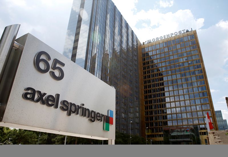 &copy; Reuters. FILE PHOTO: The logo of German publisher Axel Springer is pictured in front of the company's headquarters in Berlin July 25, 2013.  REUTERS/Fabrizio Bensch/File Photo