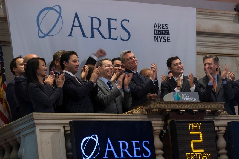 &copy; Reuters. FILE PHOTO: Ares Management LP CEO and co-founder Tony Ressler (3rd R, front) and company guests ring the opening bell at the New York Stock Exchange May 2, 2014. REUTERS/Brendan McDermid 