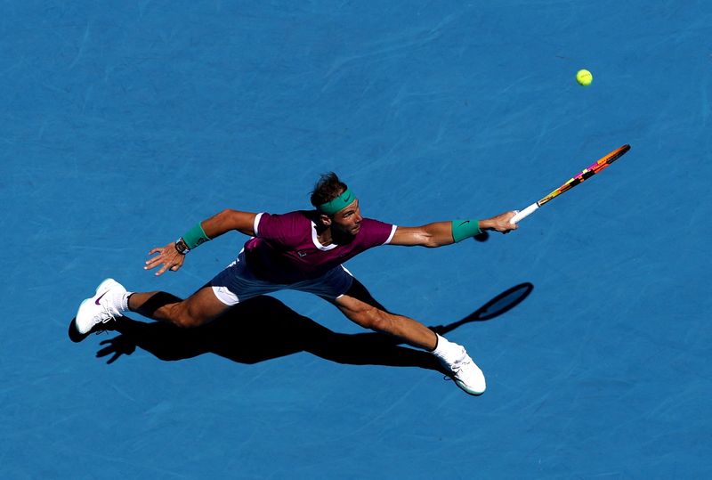 &copy; Reuters. FILE PHOTO: Tennis - Australian Open - Melbourne Park, Melbourne, Australia - January 19, 2022  Spain's Rafael Nadal in action during his second round match against Germany's Yannick Hanfmann REUTERS/Loren Elliott     