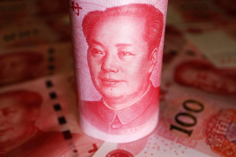 © Reuters. FILE PHOTO: Chinese Yuan banknotes are seen in this illustration picture taken June 14, 2022. REUTERS/Florence Lo/Illustration