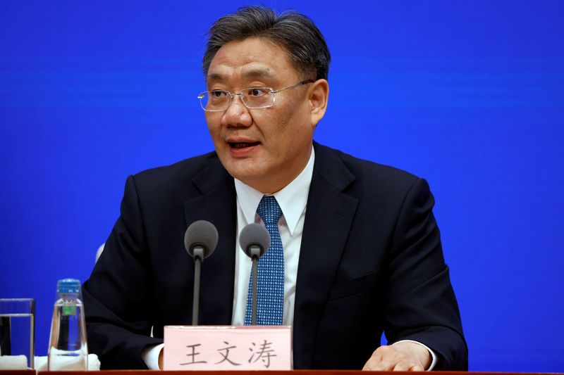 &copy; Reuters. FILE PHOTO: Chinese Commerce Minister Wang Wentao speaks during a State Council Information Office news conference in Beijing, China February 24, 2021. REUTERS/Carlos Garcia Rawlins