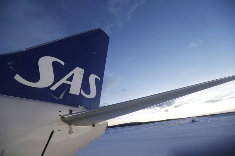 &copy; Reuters. SAS sign is seen on aircraft in the Kiruna airport, Sweden, December 16, 2015. REUTERS/Ints Kalnins