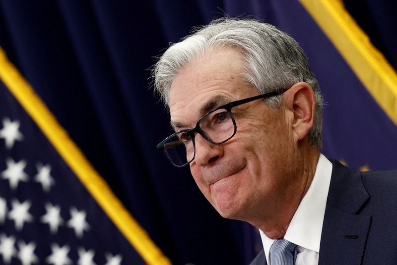 &copy; Reuters. FILE PHOTO: Federal Reserve Board Chairman Jerome Powell looks on during a news conference following the announcement that the Federal Reserve raised interest rates by half a percentage point, at the Federal Reserve Building in Washington, U.S., December 