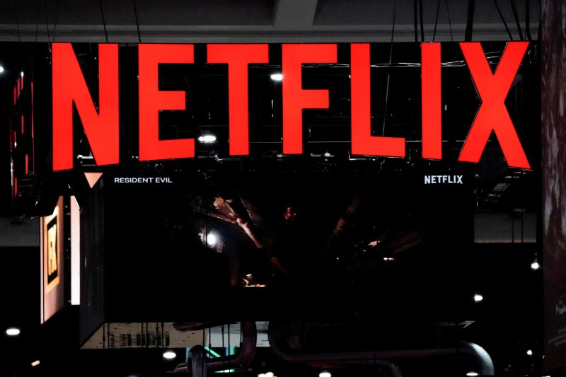 &copy; Reuters. FILE PHOTO: Signage at the Netflix booth is seen on the convention floor at Comic-Con International in San Diego, California, U.S., July 21, 2022. REUTERS/Bing Guan