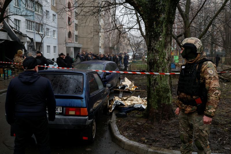 &copy; Reuters. Dead bodies lie on the ground at the site where a helicopter falls on civil infrastructure buildings, amid Russia's attack on Ukraine, in the town of Brovary, outside Kyiv, Ukraine, January 18, 2023. REUTERS/Valentyn Ogirenko