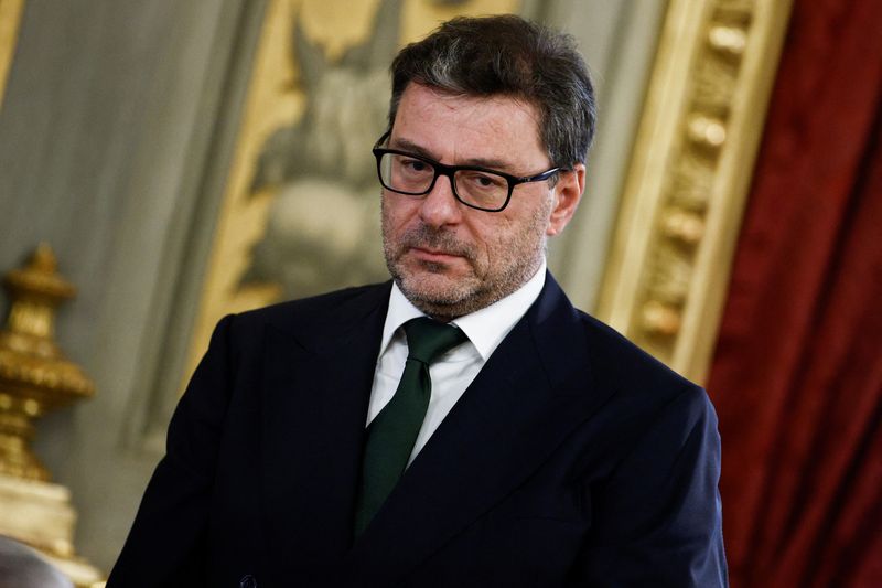 &copy; Reuters. FILE PHOTO-Italy's newly appointed Economy Minister Giancarlo Giorgetti looks on during the swearing-in ceremony at Quirinale Presidential Palace in Rome, Italy October 22, 2022. REUTERS/Guglielmo Mangiapane