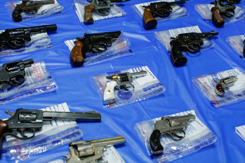 &copy; Reuters. FILE PHOTO: Guns are displayed after a gun buyback event organized by the New York City Police Department (NYPD), in the Queens borough of New York City, U.S., June 12, 2021. REUTERS/Eduardo Munoz/File Photo