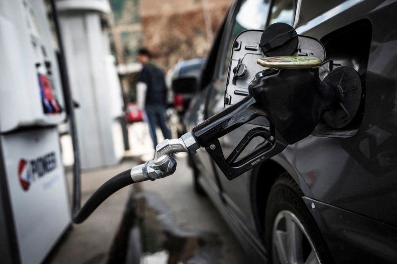 &copy; Reuters. FILE PHOTO: A fuel pump is seen in a car at a gas station in Toronto April 22, 2014. REUTERS/Mark Blinch