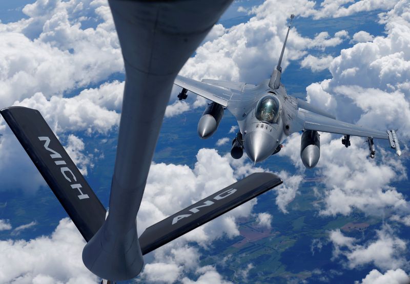 &copy; Reuters. FILE PHOTO: A U.S. Air Force F-16 fighter approaches a KC-135 aerial refueling aircraft during the U.S. led Saber Strike exercise in the air over Estonia June 6, 2018. REUTERS/Ints Kalnins/File Photo