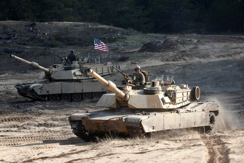 &copy; Reuters. FILE PHOTO: U.S. Army M1A1 Abrams tanks attend NATO enhanced Forward Presence battle group military exercise Crystal Arrow 2021 in Adazi, Latvia March 26, 2021 REUTERS/Ints Kalnins/File Photo