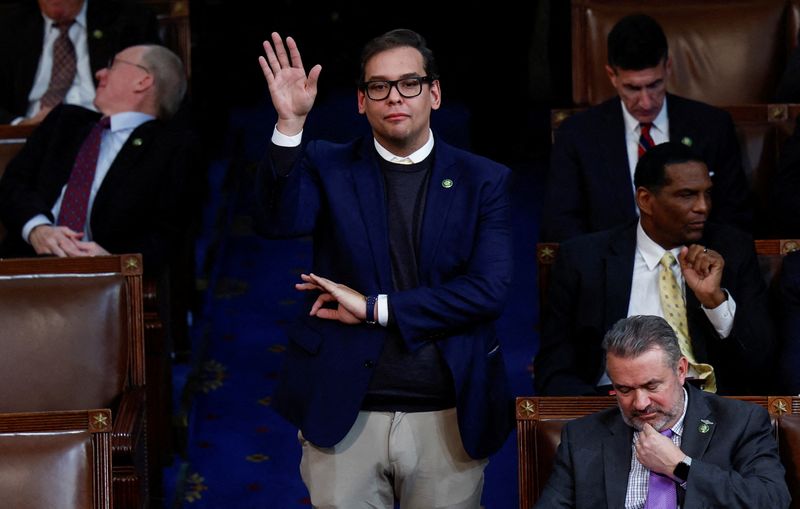 &copy; Reuters. FILE PHOTO: Newly elected freshman Rep. George Santos (R-NY), who is facing a scandal over his resume and claims he made on the campaign trail, makes a gesture with his left hand as he casts his vote for House Republican Leader Kevin McCarthy from the cen