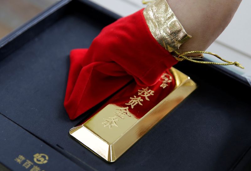 &copy; Reuters. 　１月１９日、中国黄金協会は、２０２２年の中国の金生産量は前年比１３.０９％増の３７２．０４８トンと発表した。写真は２０１９年８月、北京で撮影（２０２３年　ロイター/Jason Lee
