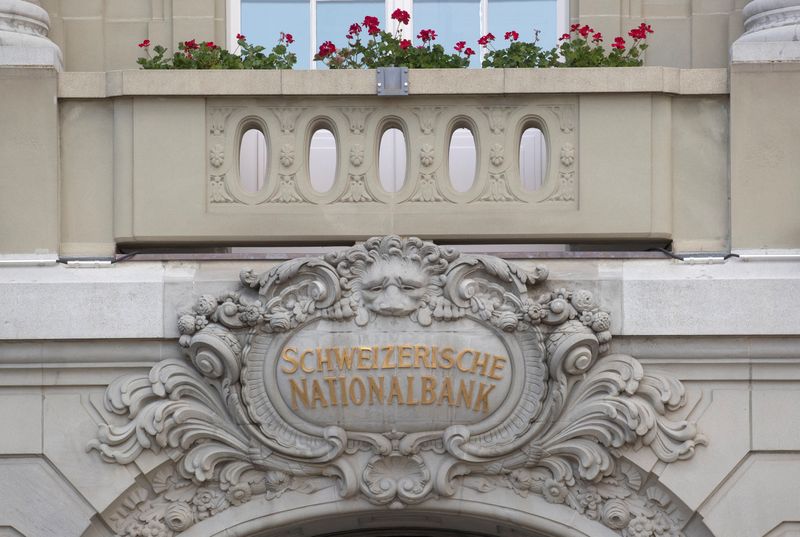 &copy; Reuters. FILE PHOTO: The Swiss National Bank (SNB) logo is pictured on its building in Bern, Switzerland June 16, 2022. REUTERS/Arnd Wiegmann/File Photo