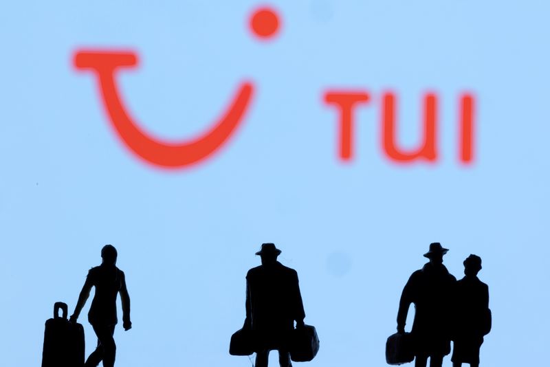 &copy; Reuters. Figurines are seen in front of the Tui logo in this illustration taken, February 27, 2022. REUTERS/Dado Ruvic/Illustration