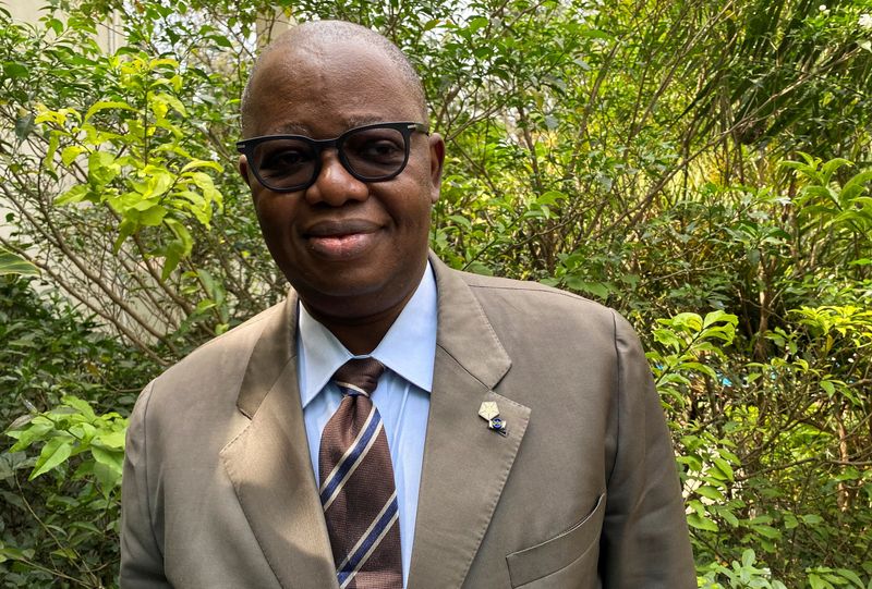 &copy; Reuters. FILE PHOTO: Gabonese Foreign Minister Michael Moussa Adamo poses for a picture during a Reuters interview at the Commonwealth Heads of Government Meeting (CHOGM) in Kigali, Rwanda June 24, 2022. REUTERS/Ayenat Mersie/File Photo