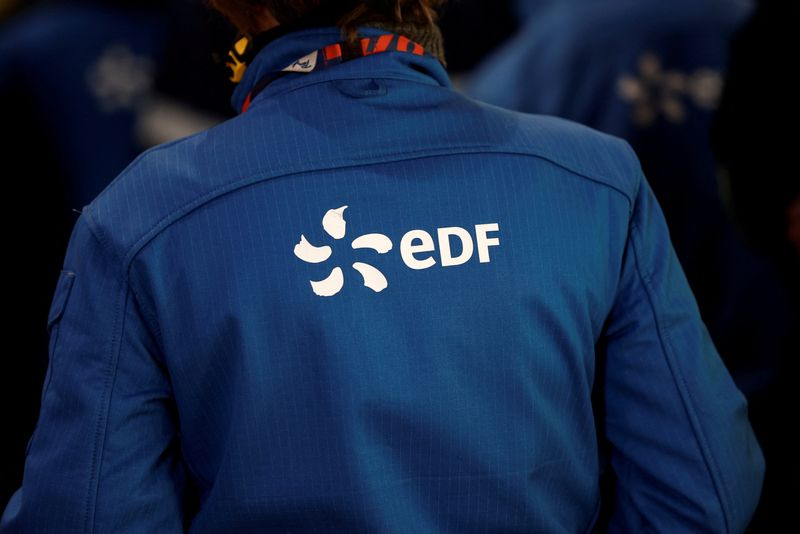 &copy; Reuters. FILE PHOTO: The EDF logo is seen on the back of an employee during a visit at French utility EDF's Penly Nuclear Power Plant in Petit-Caux, near Dieppe, France, December 9, 2022. REUTERS/Benoit Tessier/File Photo