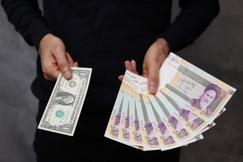 Iranian currency falls to record low amid isolation and sanctions