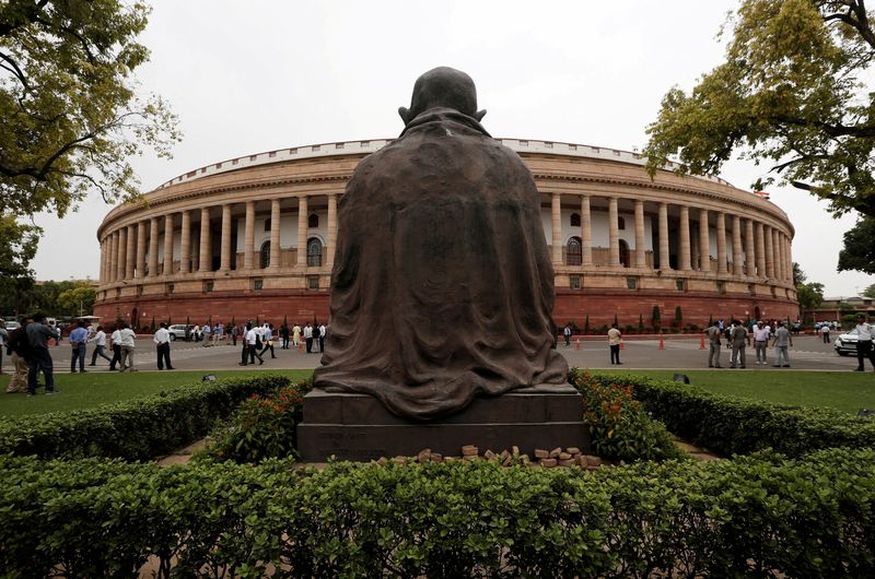 &copy; Reuters. FILE PHOTO: The Indian parliament building is pictured on the opening day of the parliament session in New Delhi, India, June 17, 2019. REUTERS/Adnan Abidi/File Photo/File Photo