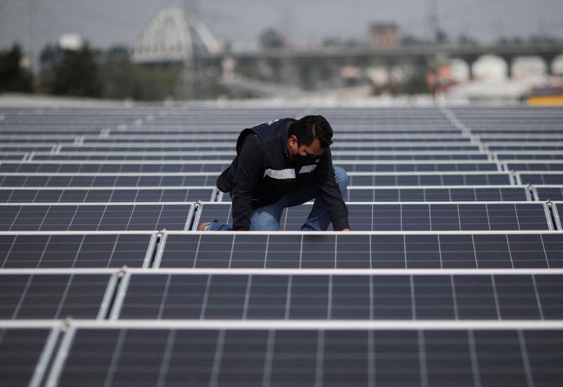 &copy; Reuters. FILE PHOTO: Carlos Bautista, a renewable energy engineer at Mexican solar company Enlight shows areas of an installed solar panel project at a client's company in Mexico state, Mexico August 19, 2022. REUTERS/Henry Romero/File Photo
