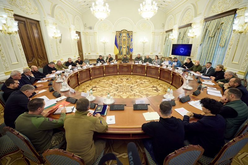 &copy; Reuters. FILE PHOTO: Ukraine's President Volodymyr Zelenskiy and top officials attend a meeting of the National Security and Defence Council, amid Russia's attack on Ukraine, in Kyiv, Ukraine September 30, 2022.  Ukrainian Presidential Press Service/Handout via RE