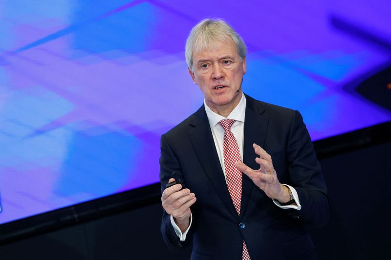 &copy; Reuters. FILE PHOTO: Peter Wennink, President and CEO of Dutch chip machine maker ASML gestures while publishing Q4 results in Veldhoven, Netherlands January 25, 2023. REUTERS/Piroschka van de Wouw