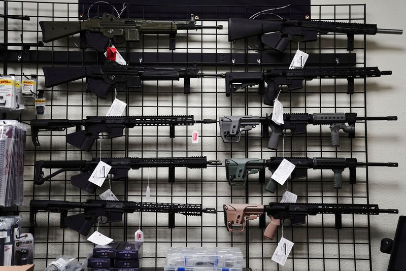 &copy; Reuters. FILE PHOTO: AR-15 style rifles are displayed for sale at Firearms Unknown, a gun store in Oceanside, California, U.S., April 12, 2021.  REUTERS/Bing Guan/File Photo