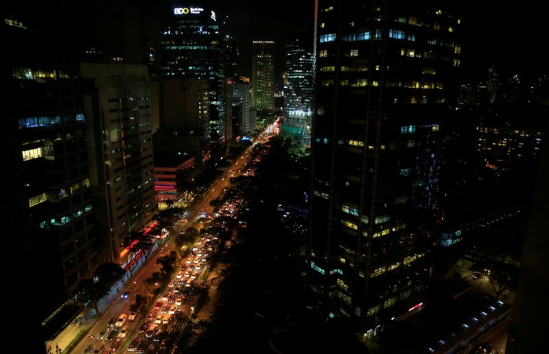 &copy; Reuters. FILE PHOTO: Buildings are seen as vehicles pass through the financial district of Makati city, metro Manila, Philippines November 22, 2017. REUTERS/Romeo Ranoco